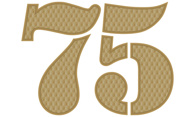 Die Zahl 75 in bronzener Fabre vor einem weißen Hintergrund.